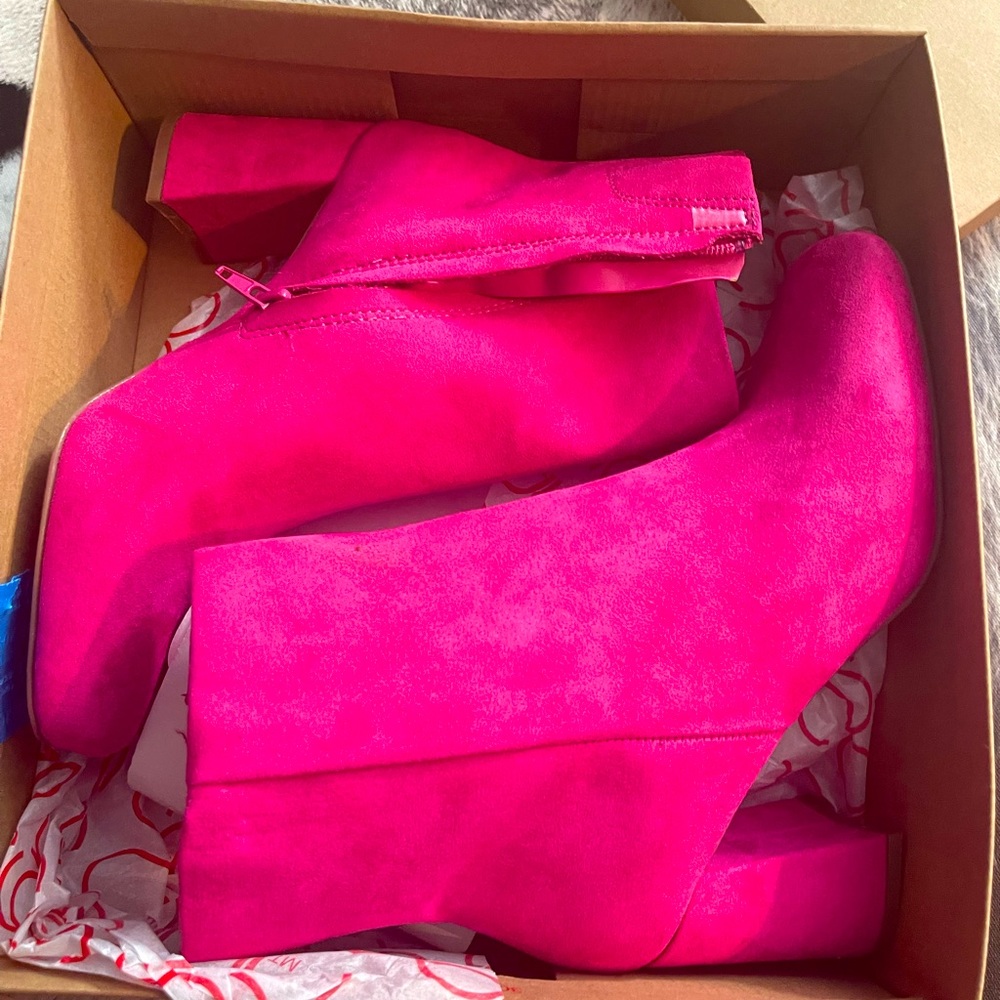 I am selling these gorgeous pink sugar ankle boots they are a must for the fall!